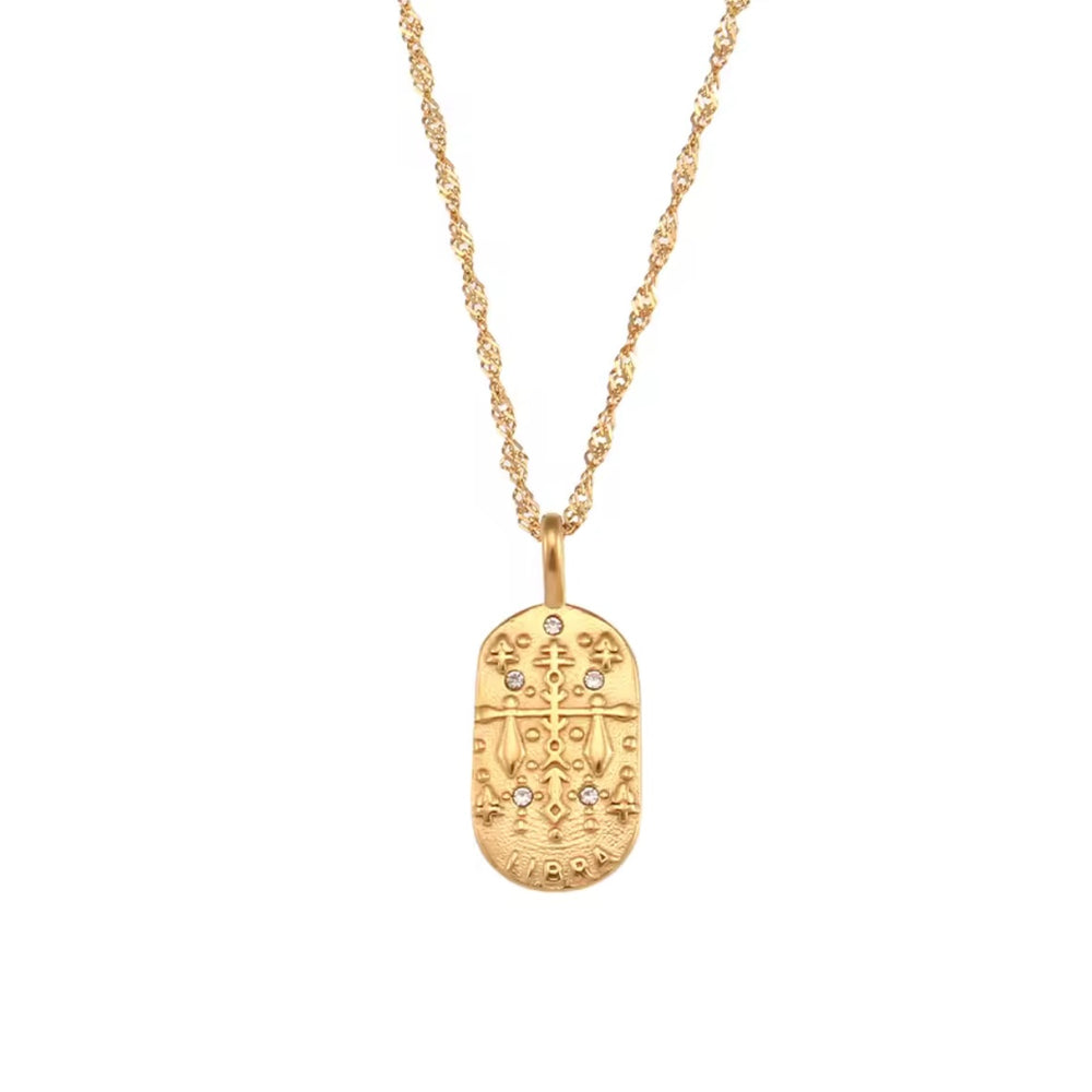 
                  
                    A dainty gold zodiac necklace inspired by vintage tarot cards — finished with sparkling CZ details and a twisted rope chain. 
                  
                