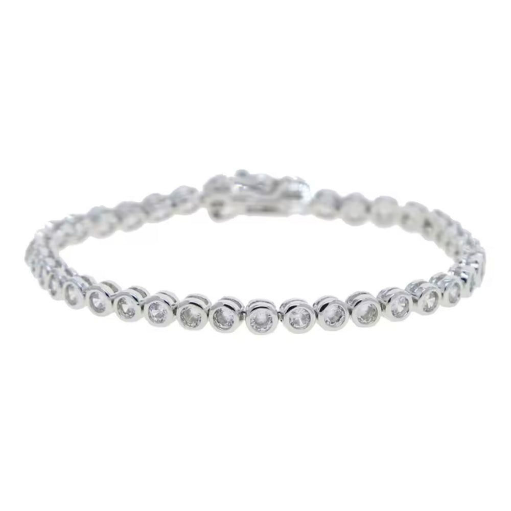 Silver  tennis bracelet with clear CZ bezel set stones on a white background