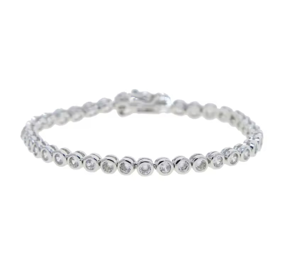 Silver  tennis bracelet with clear CZ bezel set stones on a white background